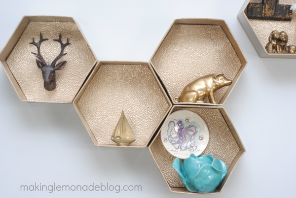 Easy DIY Hexagon Wall Shelves; you'll never guess what they're made from! ! www.makinglemonadeblog.com