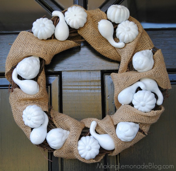 This festive fall burlap wreath was made with Dollar Store pumpkins!