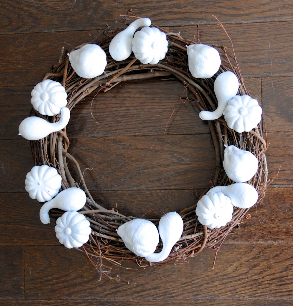 This festive fall burlap wreath was made with Dollar Store pumpkins!