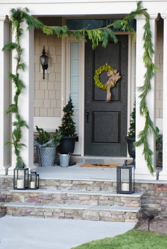 love these festive front porch DIY holiday decorations and fairy light moss wreath tutorial!