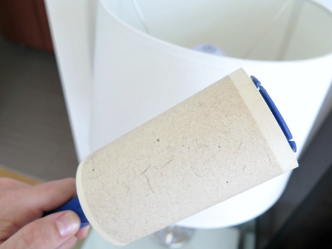 Use a lint roller to clean lamp shades