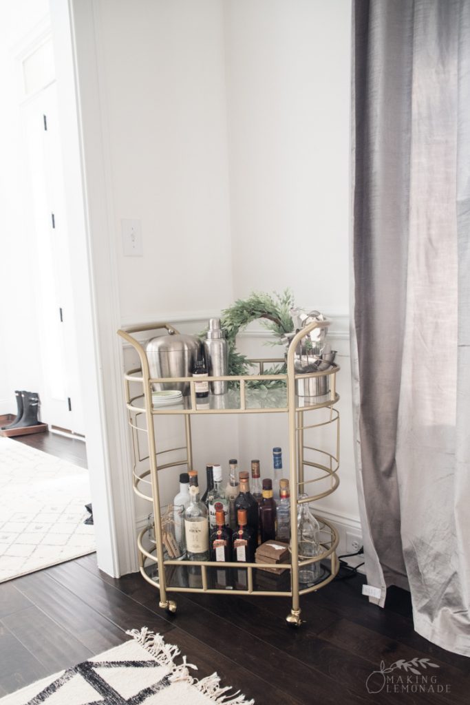 dining room update with gold bar cart