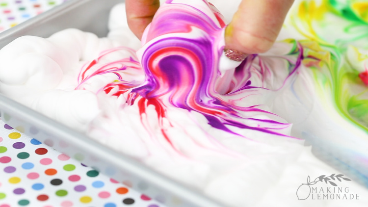 making marbleized Easter eggs with shaving cream and food coloring