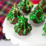 candy christmas trees on white cake stand