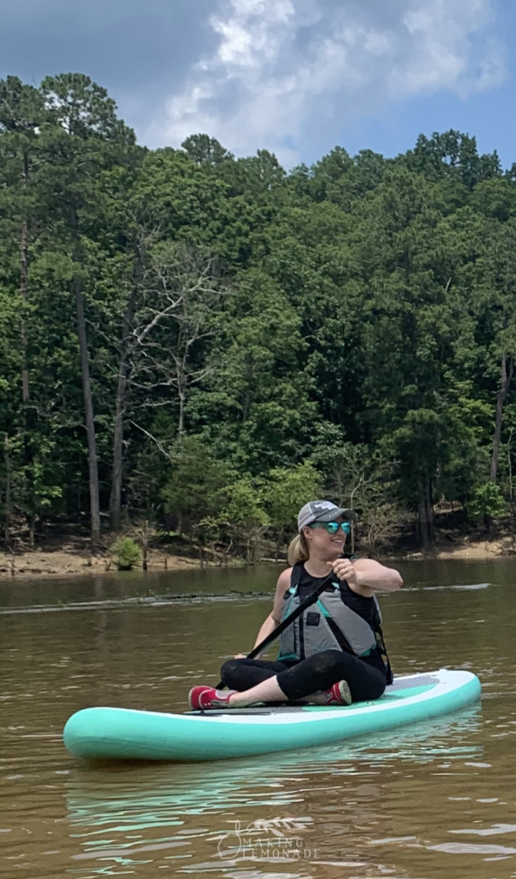 paddleboarding on river