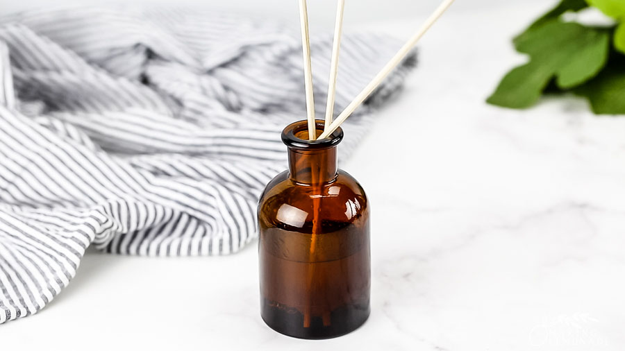3 reeds in a DIY reed diffuser with essential oils