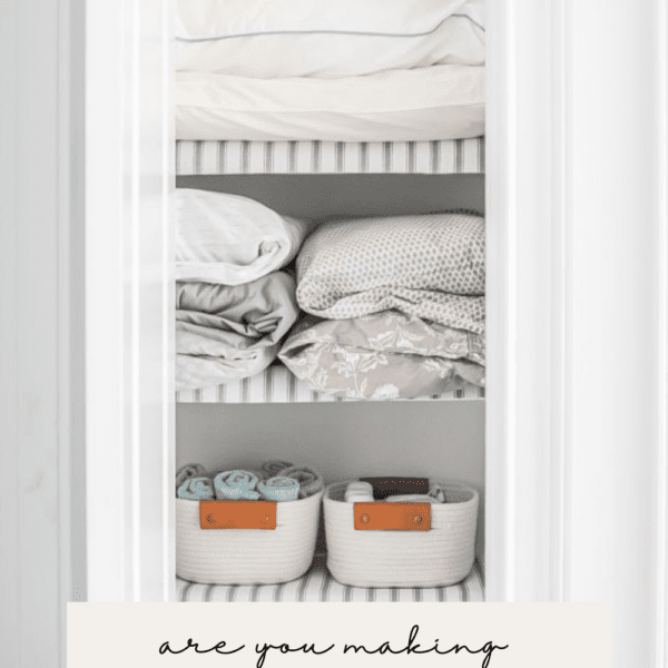 organized linen closet with text that says are you making these decluttering mistakes