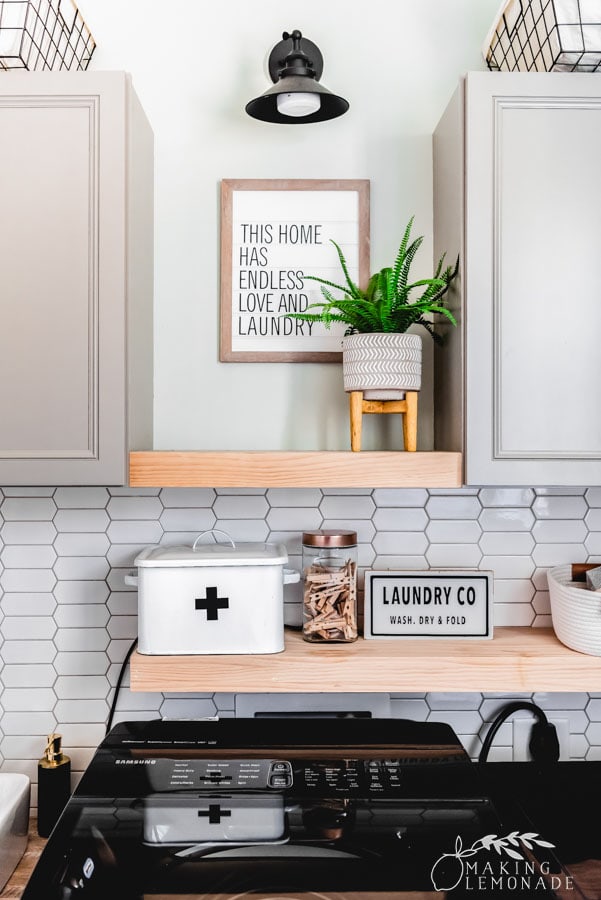 small laundry room renovation with shelves