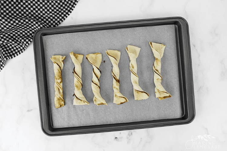 puff pastry twists on baking sheet