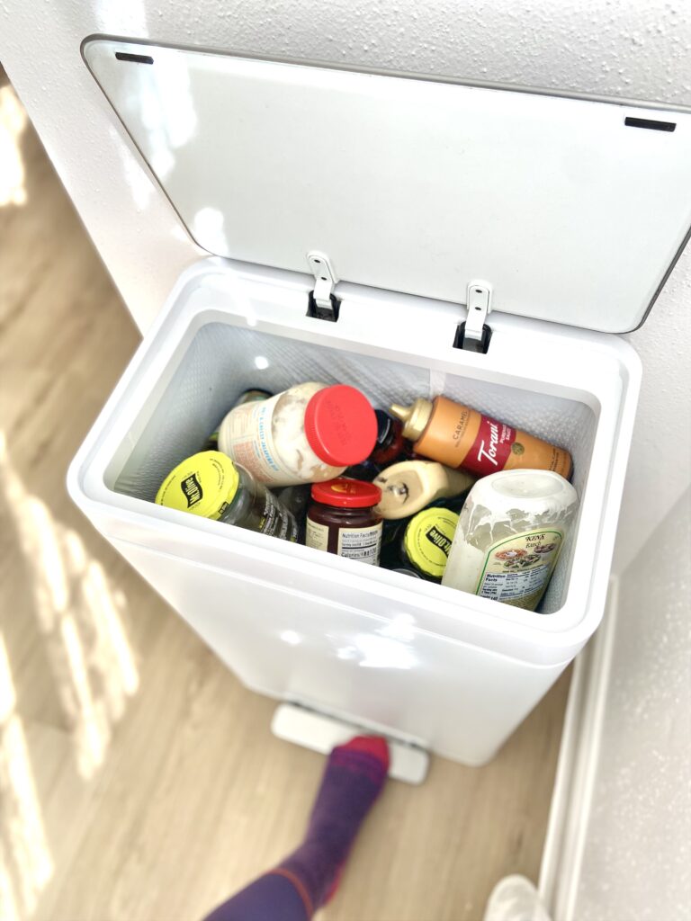 throwing away expired condiments