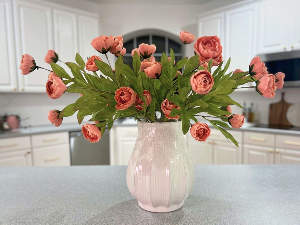 large pleated ceramic white vase with dusty pink peonies 