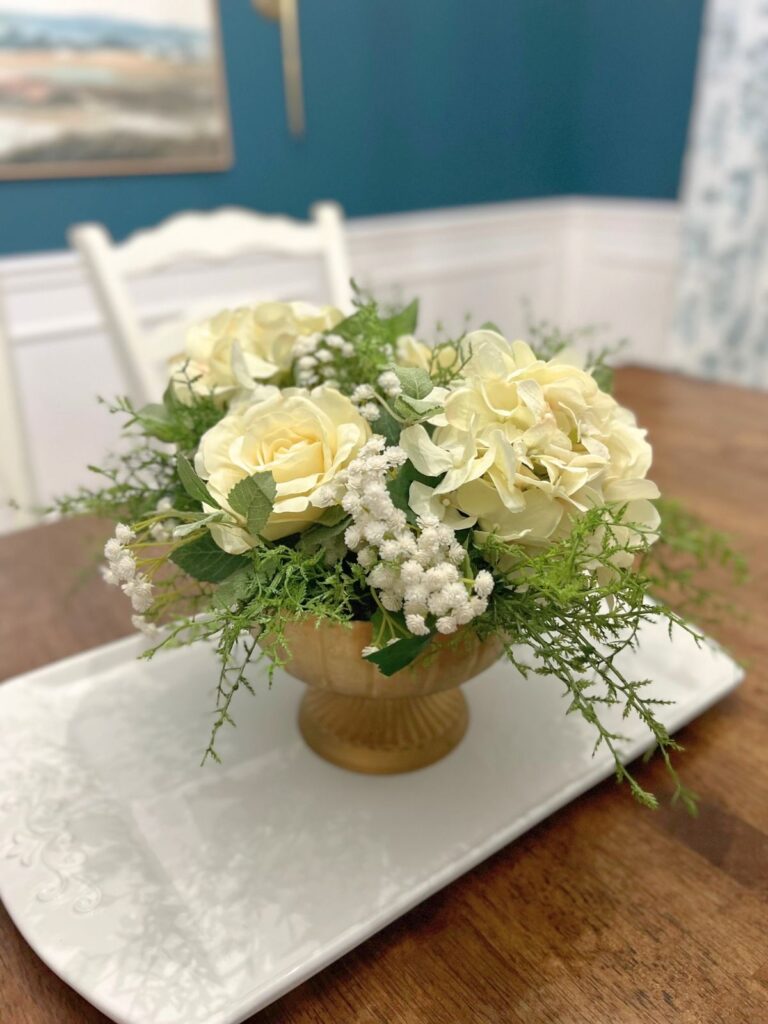 faux floral arrangement on table