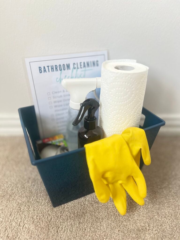 bathroom cleaning basket of supplies and checklist